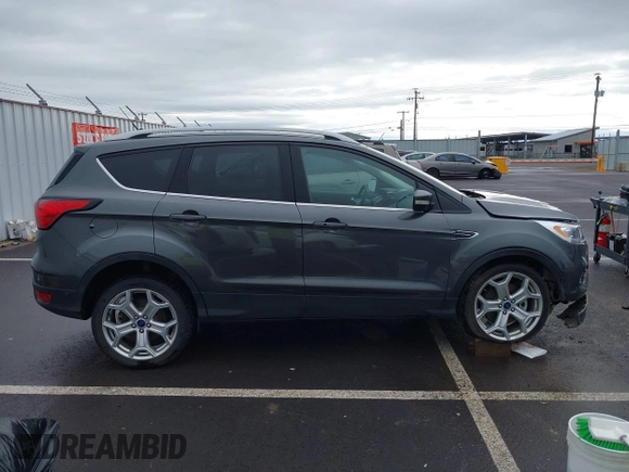 2019 Ford Escape Titanium with VIN 1FMCU9J99KUA64158, listed as a IAAI auction lot 41980102 with 52,514 mi miles. Bid and sale history available at carsss.com. Image 14.