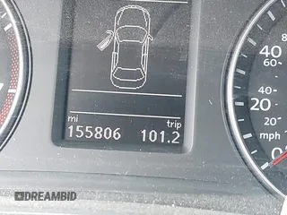 2013 Volkswagen Passat SE z VIN 1VWBH7A32DC011750, wystawiony jako IAAI lot #42199020 z przebiegiem 155 806 mil mil oraz . Historia ofert i sprzedaży dostępna na DreamBid. Obrazek 15.