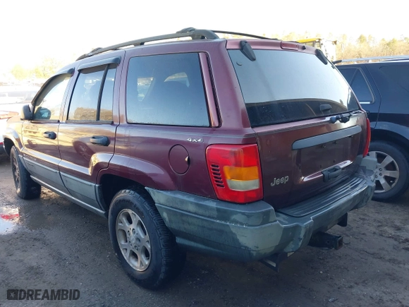 2001 Jeep Grand Cherokee Laredo with VIN 1J4GW48S11C578001, listed as a IAAI auction lot 41671318 with 263,694 mi miles. Bid and sale history available at carsss.com. Image 3.