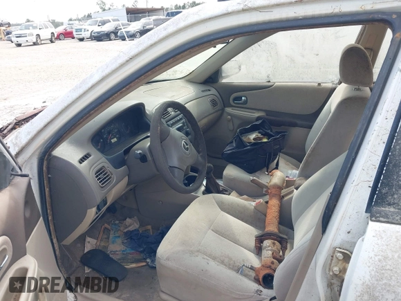 2003 Mazda Protege DX with VIN JM1BJ225730146488, listed as a IAAI auction lot 42086747 with Not Provided miles and . Bid and sale history available at DreamBid. Image 5.