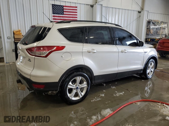 2016 Ford Escape SE with VIN 1FMCU9G98GUA57054, listed as a Copart auction lot 45194475 with 143,864 mi miles and Clean Title. Bid and sale history available at DreamBid. Image 3.