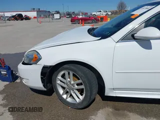 2014 Chevrolet Impala LTZ with VIN 2G1WC5E36E1182793, listed as a IAAI auction lot 41817899 with 171,776 mi miles and . Bid and sale history available at DreamBid. Image 18.