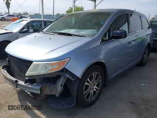 2012 Honda Odyssey EX-L с VIN 5FNRL5H68CB099810, выставлен на аукционе IAAI как лот 42127195 с пробегом 373 830 миль миль и . История ставок и продаж доступна на DreamBid. Изображение 18.
