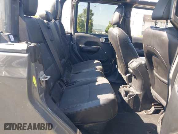 2021 Jeep Gladiator 80th Anniversary z VIN 1C6HJTAG7ML564981, wystawiony jako IAAI lot #42455062 z przebiegiem 89 721 mil mil oraz . Historia ofert i sprzedaży dostępna na DreamBid. Obrazek 8.