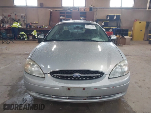 2003 Ford Taurus SES Standard with VIN 1FAFP55U13G222465, listed as a IAAI auction lot 42168336 with 128,078 mi miles. Bid and sale history available at carsss.com. Image 6.