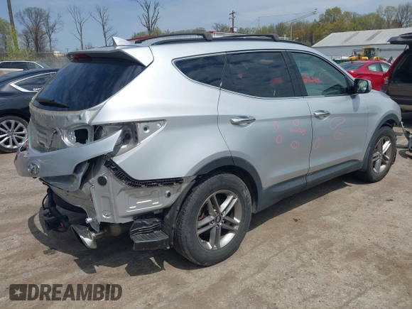2017 Hyundai Santa Fe 2.4L z VIN 5XYZUDLB6HG400828, wystawiony jako IAAI lot #42013903 z przebiegiem 88 573 mil mil oraz . Historia ofert i sprzedaży dostępna na DreamBid. Obrazek 4.