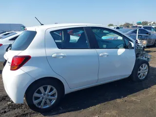 2015 Toyota Yaris L with VIN VNKKTUD30FA051732, listed as a IAAI auction lot 41449083 with 82,207 mi miles. Bid and sale history available at carsss.com. Image 14.
