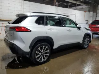 2023 Toyota Corolla Cross XLE with VIN 7MUDAABG9PV074996, listed as a Copart auction lot 47436105 with 21,766 mi miles and Salvage title. Bid and sale history available at DreamBid. Image 3.