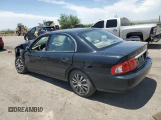 2006 Kia Optima LX z VIN KNAGD126865452524, wystawiony jako Copart lot #59813015 z przebiegiem 130 090 mil mil oraz Szkoda całkowita • Salvage title. Historia ofert i sprzedaży dostępna na DreamBid. Obrazek 2.