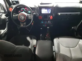 2014 Jeep Wrangler Unlimited Sport with VIN 1C4BJWDG4EL125251, listed as a Copart auction lot 51092675 with 76,867 mi miles and Clean Title. Bid and sale history available at carsss.com. Image 8.