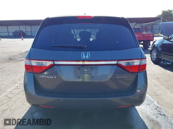 2012 Honda Odyssey Touring with VIN 5FNRL5H95CB057346, listed as a IAAI auction lot 42644094 with 114,712 mi miles and . Bid and sale history available at DreamBid. Image 17.