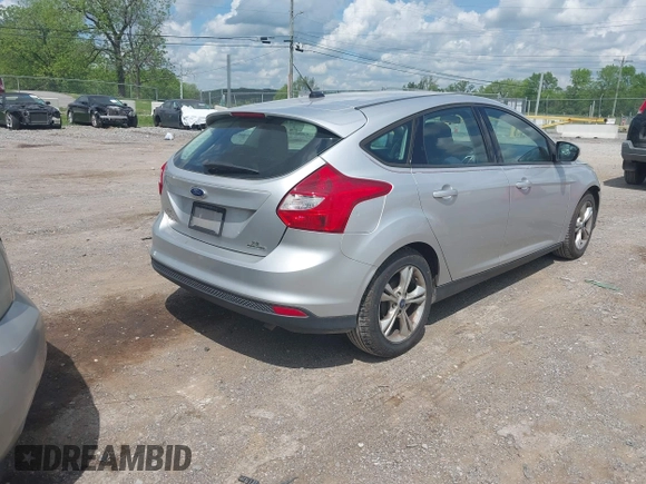 2014 Ford Focus SE with VIN 1FADP3K22EL140219, listed as a IAAI auction lot 42107380 with 205,519 mi miles. Bid and sale history available at carsss.com. Image 4.