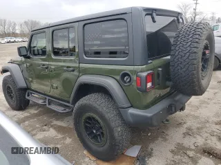 2021 Jeep Wrangler Unlimited Willys with VIN 1C4HJXDG2MW563201, listed as a Copart auction lot 50156305 with 33,372 mi miles and Salvage title. Bid and sale history available at DreamBid. Image 2.