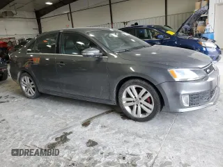 2014 Volkswagen Jetta GLI z VIN 3VW4T7AJ6EM398115, wystawiony jako Copart lot #89179925 z przebiegiem 81 264 mil mil oraz Szkoda całkowita • Salvage title. Historia ofert i sprzedaży dostępna na DreamBid. Obrazek 4.