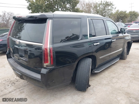 2018 Cadillac Escalade Luxury with VIN 1GYS4BKJ3JR143952, listed as a IAAI auction lot 41333902 with 124,265 mi miles. Bid and sale history available at carsss.com. Image 4.