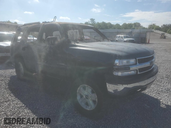 2003 Chevrolet Tahoe LS z VIN 1GNEC13Z03J273863, wystawiony jako Copart lot #56574255 z przebiegiem Nie podano mil oraz Szkoda całkowita • Salvage title. Historia ofert i sprzedaży dostępna na DreamBid. Obrazek 4.