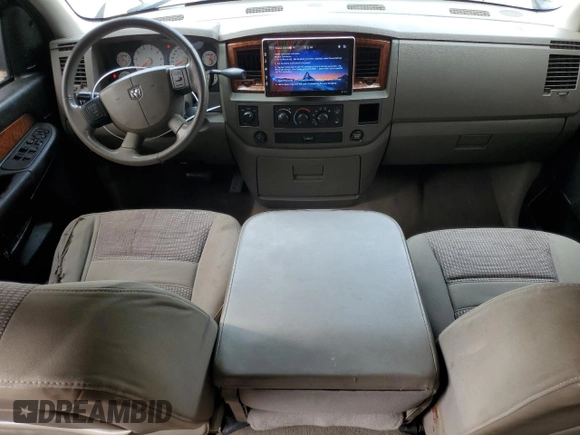 2006 Dodge 1500 SLT z VIN 1D7HU18226S669733, wystawiony jako Copart lot #55410335 z przebiegiem 143 781 mil mil oraz Szkoda całkowita • Salvage title. Historia ofert i sprzedaży dostępna na DreamBid. Obrazek 8.