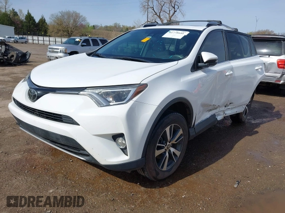 2017 Toyota RAV4 XLE with VIN 2T3WFREV3HW324973, listed as a IAAI auction lot 41778641 with 113,617 mi miles and . Bid and sale history available at DreamBid. Image 17.