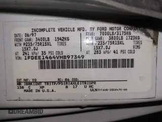 1997 Ford Econoline Commercial with VIN 1FDEE1464VHB97349, listed as a IAAI auction lot 41328090 with 72,788 mi miles. Bid and sale history available at carsss.com. Image 9.