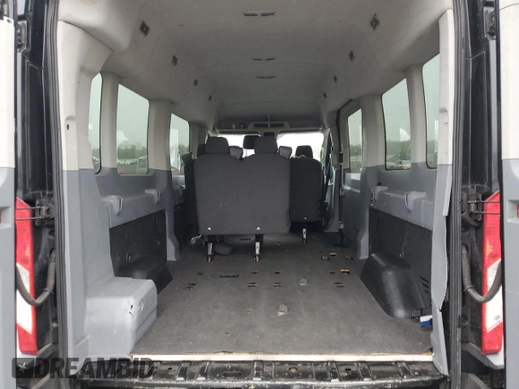 2015 Ford Transit XL z VIN 1FBZX2CM6FKA91094, wystawiony jako Copart lot #55665285 z przebiegiem 145 818 mil mil oraz Tytuł czysty. Historia ofert i sprzedaży dostępna na DreamBid. Obrazek 10.