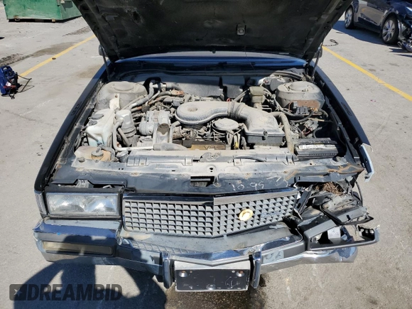 1989 Cadillac DeVille z VIN 1G6CD5151K4329443, wystawiony jako Copart lot #73939314 z przebiegiem 80 129 mil mil oraz Czysty tytuł • Clean title. Historia ofert i sprzedaży dostępna na DreamBid. Obrazek 11.