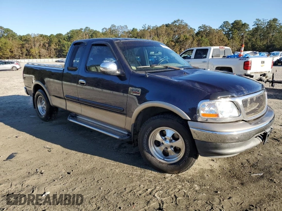 2002 Ford F-150 XL with VIN 1FTRX17L72NA39909, listed as a Copart auction lot 76376994 with 175,926 mi miles and Salvage title. Bid and sale history available at DreamBid. Image 4.