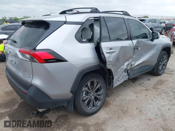 2023 Toyota RAV4 Hybrid XLE Premium z VIN 4T3B6RFV2PU138031, wystawiony jako IAAI lot #42127990 z przebiegiem 14 191 mil mil oraz . Historia ofert i sprzedaży dostępna na DreamBid. Obrazek 4.