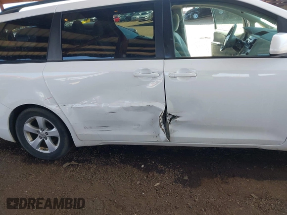 2012 Toyota Sienna LE AAS with VIN 5TDKK3DC4CS274117, listed as a IAAI auction lot 42008690 with 205,353 mi miles. Bid and sale history available at carsss.com. Image 6.