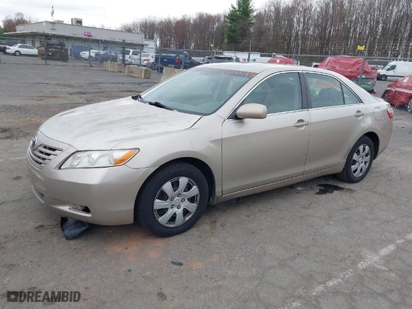 2007 Toyota Camry CE with VIN 4T1BE46K07U700447, listed as a IAAI auction lot 42085195 with 254,770 mi miles. Bid and sale history available at carsss.com. Image 2.