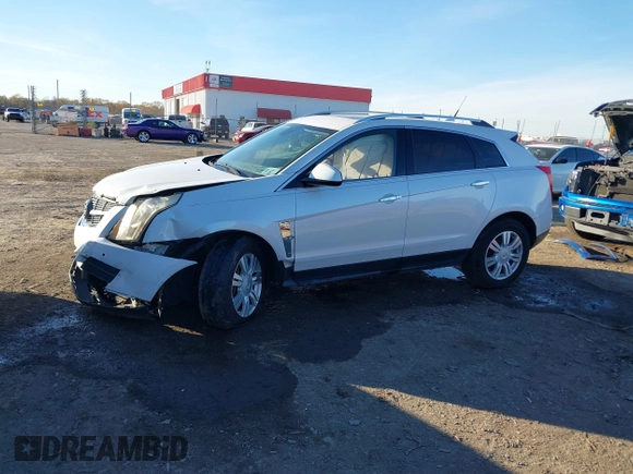 2012 Cadillac SRX Luxury Collection z VIN 3GYFNAE37CS576292, wystawiony jako IAAI lot #41048054 z przebiegiem 158 948 mil mil oraz . Historia ofert i sprzedaży dostępna na DreamBid. Obrazek 14.