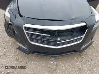 2014 Cadillac CTS Luxury AWD with VIN 1G6AX5SX9E0197395, listed as a IAAI auction lot 42211452 with 90,657 mi miles and . Bid and sale history available at DreamBid. Image 6.