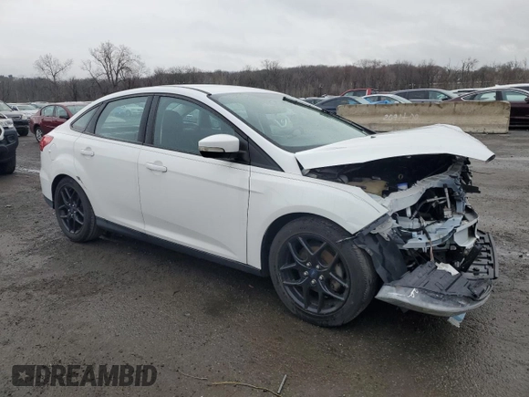 2016 Ford Focus SE z VIN 1FADP3F2XGL223796, wystawiony jako Copart lot #52567505 z przebiegiem Nie podano mil oraz Szkoda całkowita • Salvage title. Historia ofert i sprzedaży dostępna na DreamBid. Obrazek 4.