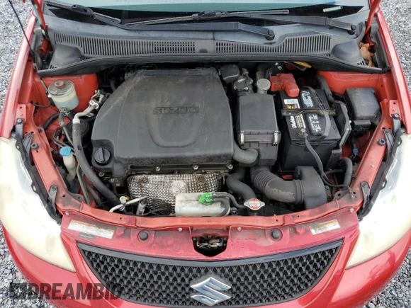 2012 Suzuki SX4 LE with VIN JS2YC5A39C6300577, listed as a Copart auction lot 86998944 with 103,354 mi miles and Non Repairable. Bid and sale history available at carsss.com. Image 13.