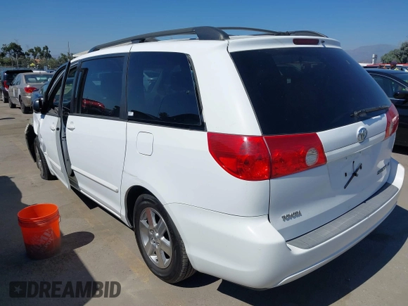 2010 Toyota Sienna CE with VIN 5TDKK4CC4AS293772, listed as a IAAI auction lot 39408854 with 118,238 mi miles and . Bid and sale history available at DreamBid. Image 3.