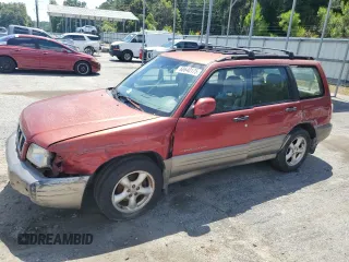 2002 Subaru Forester S with VIN JF1SF65522H736740, listed as a Copart auction lot 60640175 with 318,267 mi miles and Salvage title. Bid and sale history available at DreamBid. Image 1.