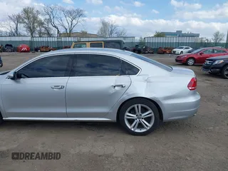 2012 Volkswagen Passat SE w/Sunroof with VIN 1VWBM7A32CC100678, listed as a IAAI auction lot 41925484 with 154,373 mi miles. Bid and sale history available at carsss.com. Image 6.