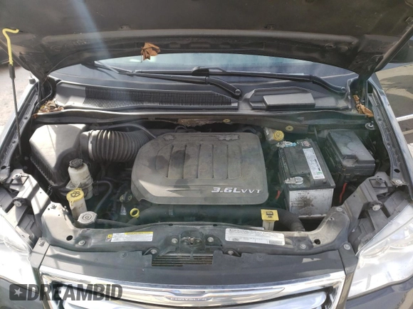 2012 Chrysler Town & Country Touring with VIN 2C4RC1BG8CR299908, listed as a Copart auction lot 37181562 with 95,287 mi miles and Salvage Title. Bid and sale history available at DreamBid. Image 7.