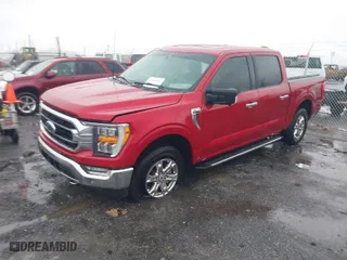 2021 Ford F-150 XL with VIN 1FTFW1E84MKE97559, listed as a IAAI auction lot 41544523 with 54,867 mi miles. Bid and sale history available at carsss.com. Image 2.