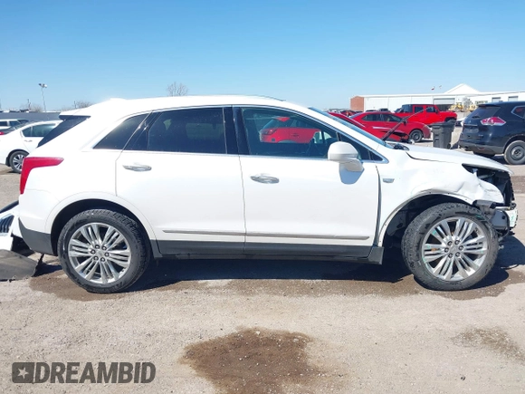 2017 Cadillac XT5 Premium Luxury FWD z VIN 1GYKNCRS9HZ106397, wystawiony jako IAAI lot #41659420 z przebiegiem 54 615 mil mil oraz . Historia ofert i sprzedaży dostępna na DreamBid. Obrazek 14.