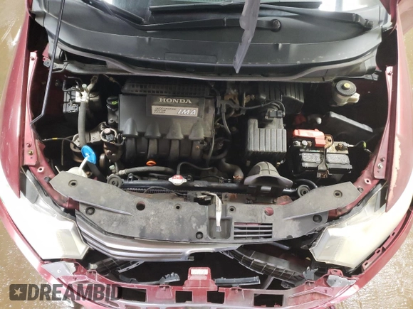 2010 Honda Insight LX with VIN JHMZE2H52AS034613, listed as a Copart auction lot 52701795 with 232,541 mi miles and Salvage Title. Bid and sale history available at DreamBid. Image 11.