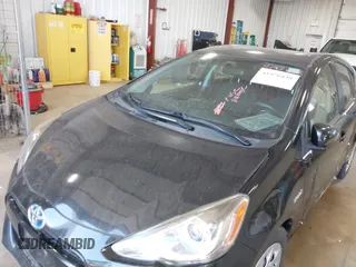 2016 Toyota Prius c One with VIN JTDKDTB3XG1124674, listed as a IAAI auction lot 41976438 with 72,028 mi miles. Bid and sale history available at carsss.com. Image 6.