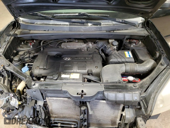 2007 Hyundai Tucson GLS with VIN KM8JM12B67U653377, listed as a Copart auction lot 52243225 with 203,440 mi miles and Salvage Title. Bid and sale history available at carsss.com. Image 12.