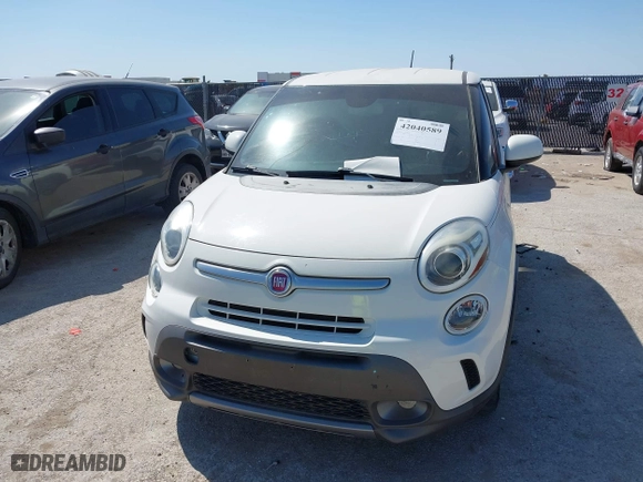 2014 FIAT 500L Trekking with VIN ZFBCFADH2EZ007586, listed as a IAAI auction lot 42040589 with 69,793 mi miles. Bid and sale history available at carsss.com. Image 6.