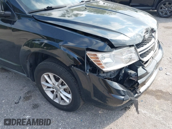 2013 Dodge Journey SE with VIN 3C4PDCAB0DT710609, listed as a IAAI auction lot 41763431 with 145,851 mi miles and . Bid and sale history available at DreamBid. Image 13.