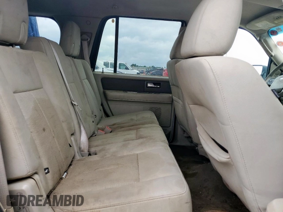 2013 Ford Expedition XLT z VIN 1FMJU1J51DEF09236, wystawiony jako Copart lot #57498685 z przebiegiem 266 883 mil mil oraz Szkoda całkowita • Salvage title. Historia ofert i sprzedaży dostępna na DreamBid. Obrazek 11.
