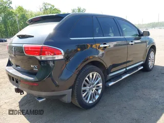 2011 Lincoln MKX with VIN 2LMDJ8JKXBBJ31273, listed as a IAAI auction lot 42170426 with 127,880 mi miles. Bid and sale history available at carsss.com. Image 4.