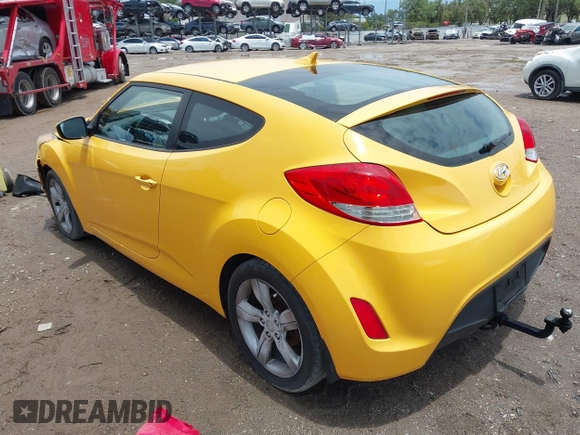 2012 Hyundai Veloster w/Black Int with VIN KMHTC6AD5CU046702, listed as a IAAI auction lot 42245379 with 136,327 mi miles and . Bid and sale history available at DreamBid. Image 3.