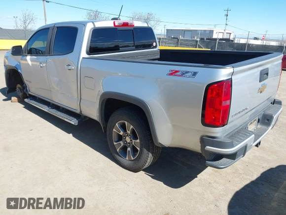 2019 Chevrolet Colorado 4WD Z71 z VIN 1GCGTDEN2K1146043, wystawiony jako IAAI lot #41712002 z przebiegiem 84 034 mil mil oraz . Historia ofert i sprzedaży dostępna na DreamBid. Obrazek 3.