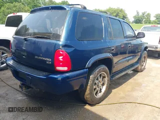 2003 Dodge Durango SLT z VIN 1D4HS48N33F540550, wystawiony jako IAAI lot #42413911 z przebiegiem 309 084 mil mil oraz . Historia ofert i sprzedaży dostępna na DreamBid. Obrazek 4.