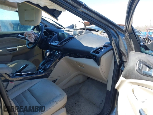 2015 Ford Escape Titanium with VIN 1FMCU0J90FUC10514, listed as a IAAI auction lot 41785756 with 222,434 mi miles and . Bid and sale history available at DreamBid. Image 5.